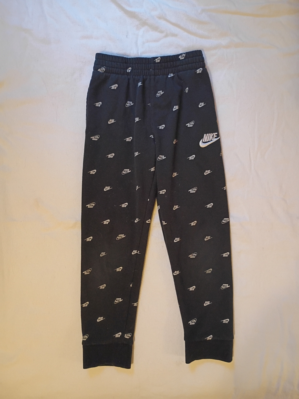 Nike Black Joggers with White Logo Allover - Kids
